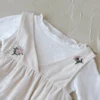 cn-11134207-7ras8-mbbtabsuxq7529 Baby Floral Embroidered Long Sleeve Romper Set
