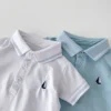 sg-11134201-7rdvf-m1c6l10ch28nad Baby Sailboat Polo Romper